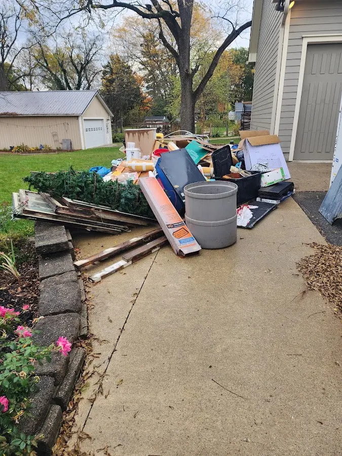 Dumpster being loaded with debris for Residential Dumpster Rental in California City